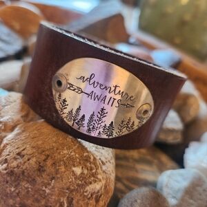 ARTISAN LEATHER CUFF WITH HAND STAMPED METAL "ADVENTURE AWAITS"